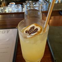 Pineapple and star anise mocktail. Wooden straw was a nice touch .  at Viceroy in Durham