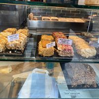 The Biscoff and cherry & coconut flapjacks are vegan at Oatopia - Kiosk in Croydon