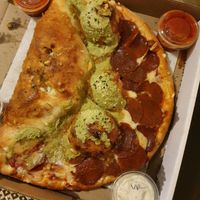 Vegan Triathlon  with pepperoni pizza garlic knots and vegan mac n cheese calzone  at CyBelle's Front Room in San Francisco