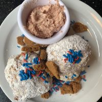Half order of vegan cheesecake beignets   at CyBelle's Front Room in San Francisco