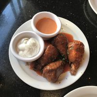 Flaming hot wings  at CyBelle's Front Room in San Francisco