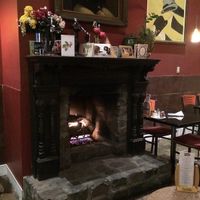 Cozy Fireplace original since 1973 at CyBelle's Front Room in San Francisco