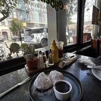 Vegan beignets with chocolate sauce   at CyBelle's Front Room in San Francisco