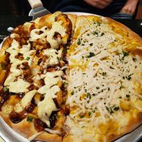 halfsies pizza - golden dragon pizza on the left/ mac n cheeze on the right 😍 at CyBelle's Front Room in San Francisco
