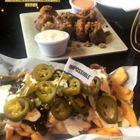 Fries and wings at CyBelle's Front Room in San Francisco