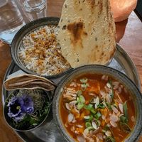 Tofu Tikka Masala: Indian masala curry with onion, tomato, bell pepper, and tofu served with chapati, mango chutney, and basmati rice. at Golden Temple in Amsterdam