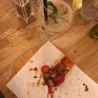 Mint cocktail and vegan pizza at Sugo Pizza Al Taglio in Amsterdam