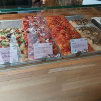 Vegan pizza selection at Sugo Pizza Al Taglio in Amsterdam