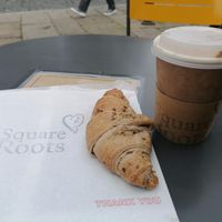 Croissant and coffee at Square Roots in Whitley Bay