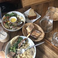 buddha bowl spread w/ bread  at Le Labo in Lyon