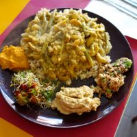 A steaming 'Veggie dish from the rainforest in Borneo', vegan.  at De Vliegende Schotel - The Flying Saucer in Amsterdam