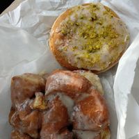 Apple fritter and matcha cream donut. at Dottie's Donuts - Queen Village in Philadelphia