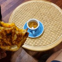 Spicy veg pulled beef jaffle and espresso at Union Kiosk in Melbourne