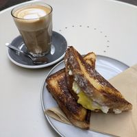 Tofu scramble jaffle with almond milk latte at Union Kiosk in Melbourne