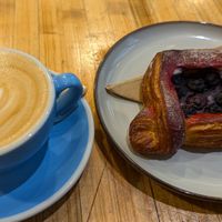 Beautiful latte art and a bunch of vegan pastries to choose from at Union Kiosk in Melbourne