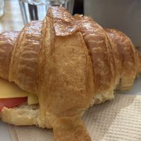 Toasted Croissant with “cheese” and tomato  at Union Kiosk in Melbourne