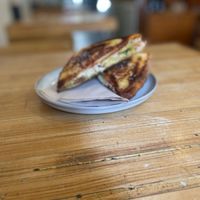 chilli tofu scramble, sausage and feta. Delish! at Union Kiosk in Melbourne