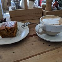 Vegan 🥕 cake and cappuccino with soy milk. at The Factory Cafe in Koh Tao