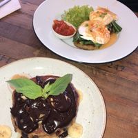 Choc chip pancakes & eggs benedict  at The Factory Cafe in Koh Tao