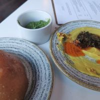 Focaccia, wild garlic/tropea onion confit/parsnip & curry leaves at The Omni Collective in South East London