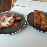 Iberiko tomatoes, shio koji, radish/1000 layer potatoes, caramelised shiitake ketchup. at The Omni Collective in South East London