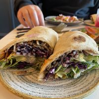 Oyster mushroom Shawarma wrap and tahini butternut squash, rocket salad   at The Omni Collective in South East London