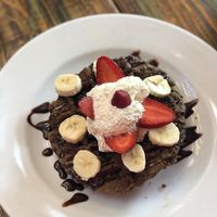 Waffle with fresh fruit (strawberries, bananas, blueberries, raspberries) and chocolate  at Plan V Cafe in Mexico City