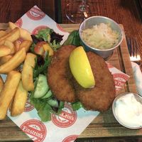 Vegan schnitzel with chunky chips and sauerkraut  at Einstein's in Chesterfield