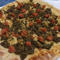 Pizza salsiccia e friarielli vegana at Veganfruttariano in Milan