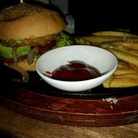 Vegan burger with fries at What Else Cafe in Hoi An