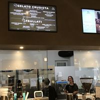 The display of the  flavors of the day at Grezzo Raw Chocolate in Turin