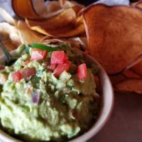 Guacamole with plantain and taro chips at Bomba Tacos & Rum in Fairlawn