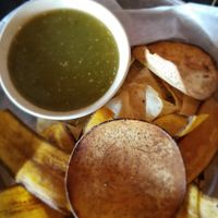 Salsa verde with plantain and taro chips at Bomba Tacos & Rum in Fairlawn
