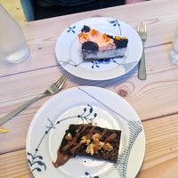 Sea buckthorn berry baked cheese cake and a brownie. Both gluten free.  at Yellow Rose in Copenhagen