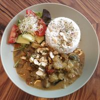 Eggplant curry with tomatoes and cashews at Cafe Juli in Aachen