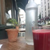Table in front of eatery at Welcome in Paris