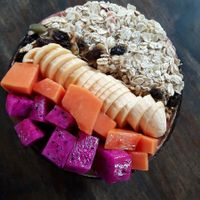 Acai bowl with oats and extra fruits at Bom Bowls in Pai