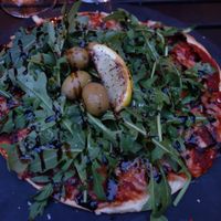 Tomato pizza with vegan cheese at AHUS Finest in Ahus