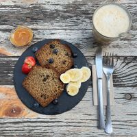 Banana cake with walnuts and chocolate and homemade salted caramel sauce (very delicious!!) & vanilla chai, all vegan  at Cafe Brooks in Hamburg