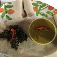 Pea-Dal with greens and a big injera (14.500 TZS)  at Spices and Herbs Restaurant in Arusha