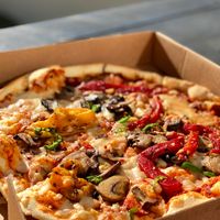 Mushrooms, peppers, chilli and vegan cheese  at Sorella Sorella in Gateshead