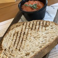 Tostada - simple Spanish pulped tomato breakfast, and you add the salt and olive oil as preferred   at Manuka - Plaza del Mar in Marbella