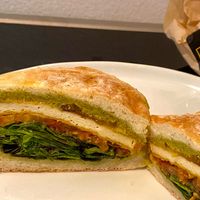 pesto breakfast sandwich (plated at home) at Cafe Red in Seattle