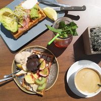 Non vegan waffle with avo and salmon, vegan waffle with fresh fruit and peanut and chocolate ice cream at Claus Eismanufaktur & Deli in Stuttgart