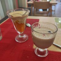 Postres del menú del día: panacotta y vasito de yogur con melocotón at Veggie Penguin in Tenerife