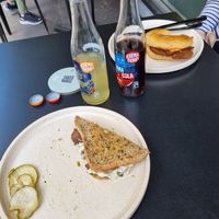 Mushroom sandwich on gf toast with side of pickles. Egg and bacon bagel plus karma cola and ginger beer! at Shift Eatery in Surry Hills
