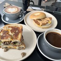My Shroom Toastie, Vegan Bacon and Eggs Bagel, cappuccino, coffee   at Shift Eatery in Surry Hills