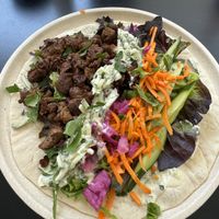 Lamb & Tzatziki Wrap, $20.99  at Shift Eatery in Surry Hills