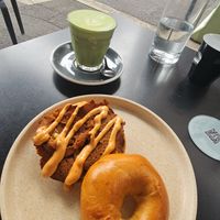 Matcha Latte with the vegan bacon Bagel at Shift Eatery in Surry Hills