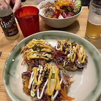 Vegan patacones and a healthy bowl with tofu. Ginger soda.  at Avocado in Barcelona